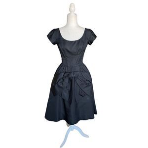 Vintage Gus Mayer 60s black cocktail flared out bow front cocktail dress